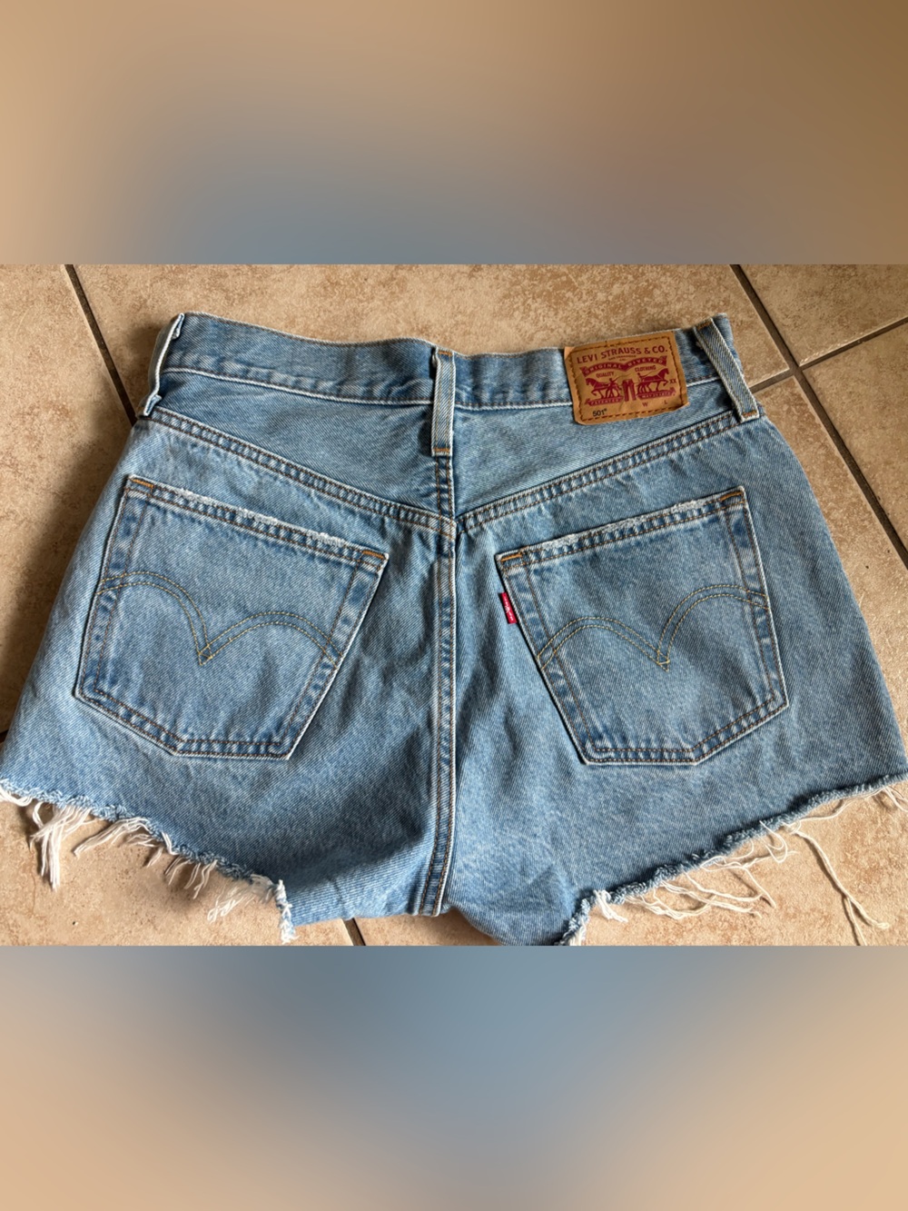 501 distressed Levi’s denim shorts